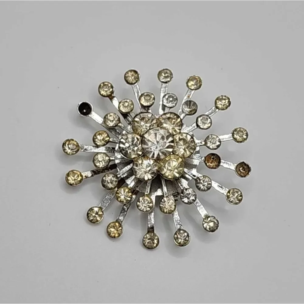5/$20 Vintage silver rhinestone burst brooch